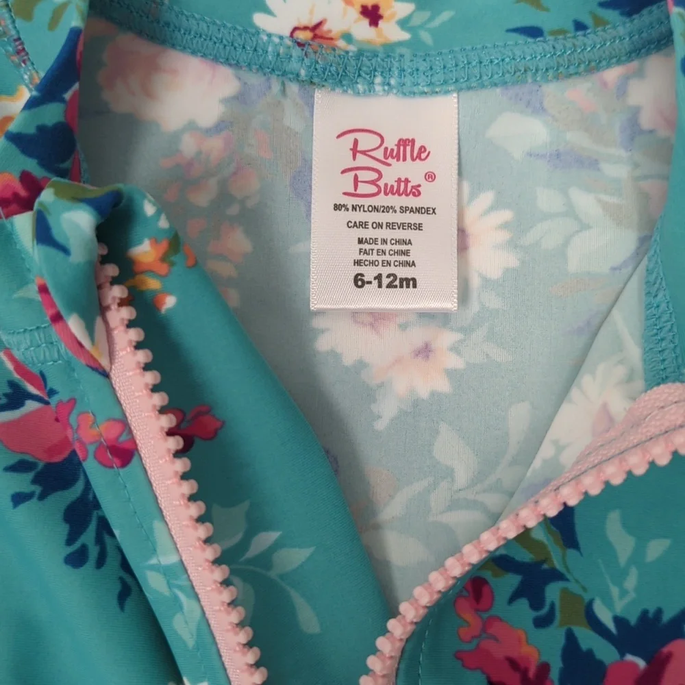LIKE NEW Ruffle Butts Infant Long Sleeve Zipper Rash Guard in Fancy Me Floral